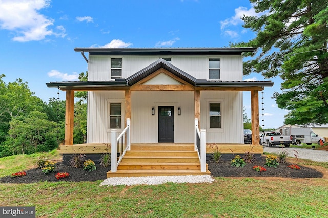 modern farmhouse featuring covered porch