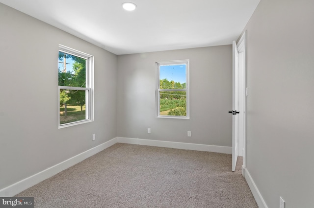 empty room with light carpet