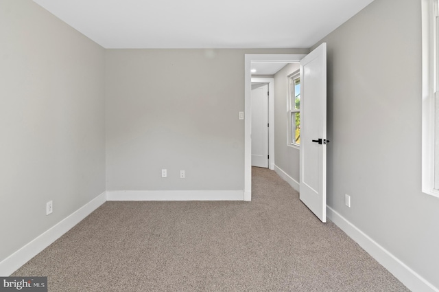 view of carpeted spare room