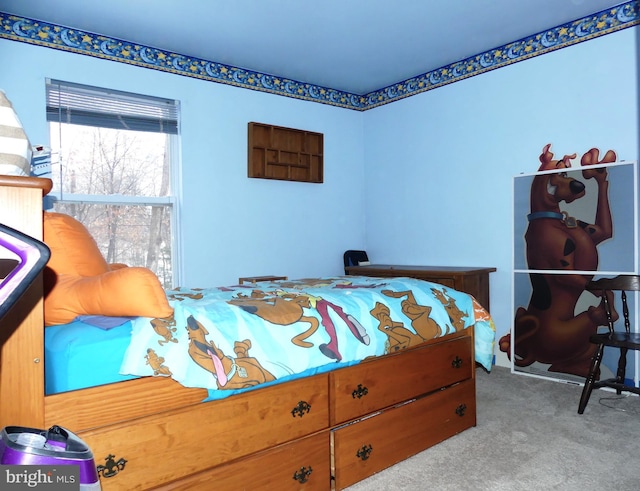 bedroom with light colored carpet