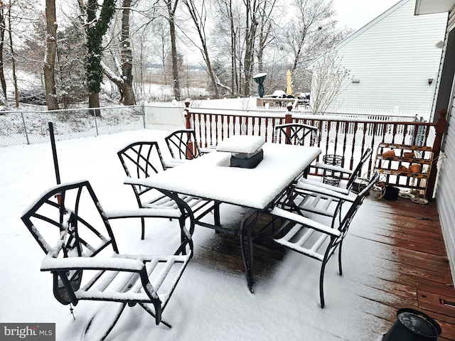 view of snow covered deck