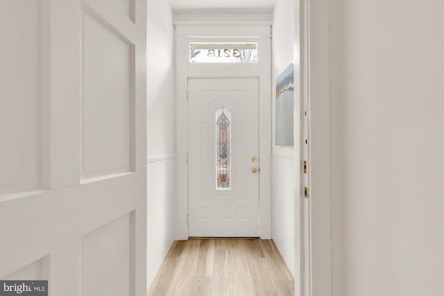 entryway featuring light wood-style flooring