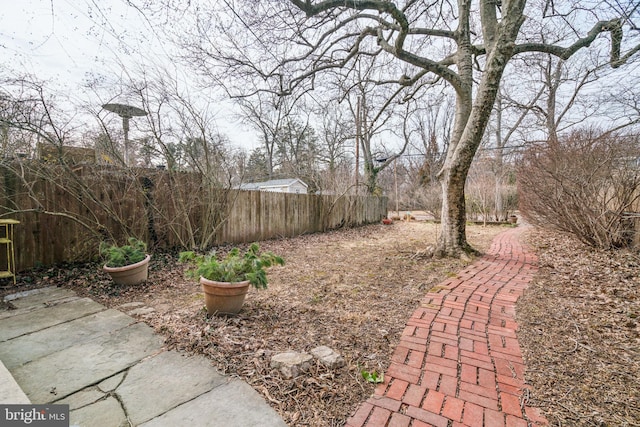 view of yard with fence