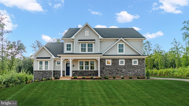 craftsman-style home with a front lawn