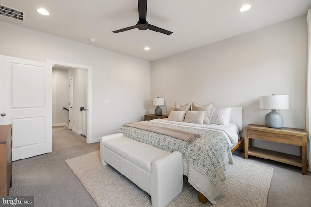 bedroom with ceiling fan, recessed lighting, light carpet, visible vents, and baseboards