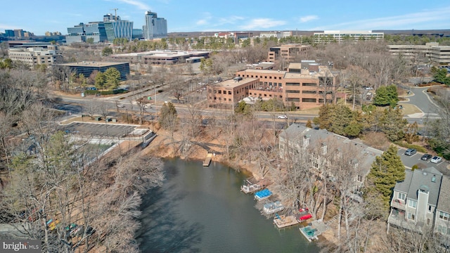 aerial view featuring a water view and a view of city