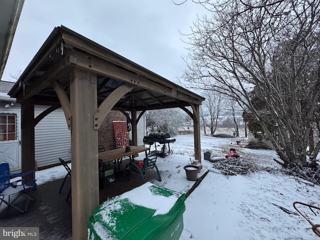 exterior space with a gazebo and grilling area