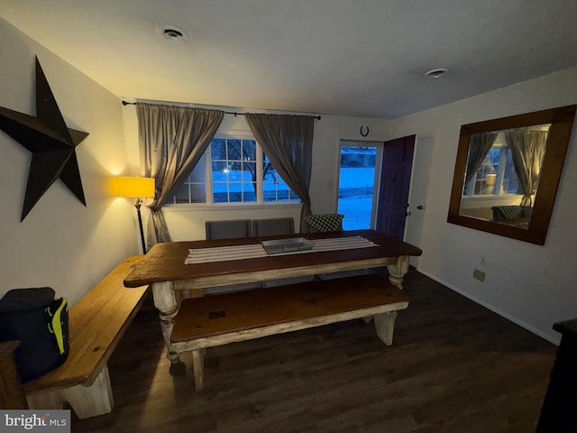 bedroom featuring dark hardwood / wood-style flooring