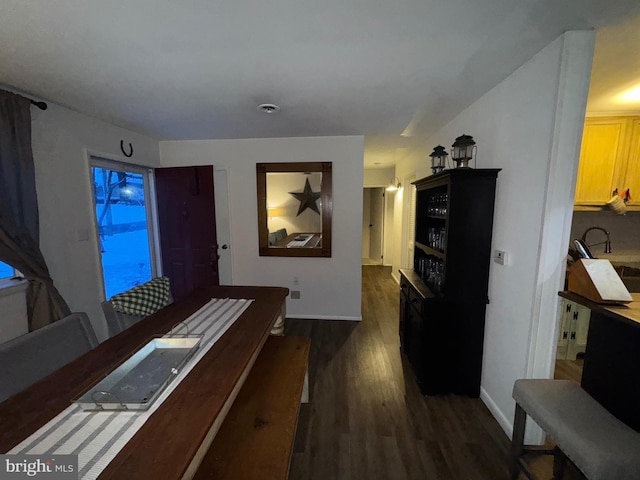 corridor with dark wood-type flooring