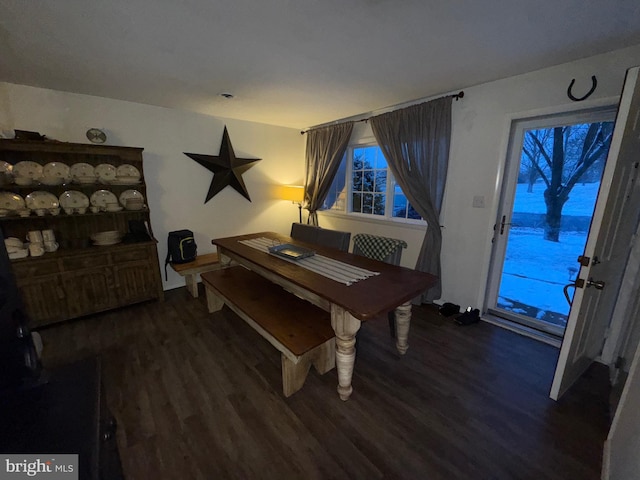 dining area featuring dark hardwood / wood-style floors