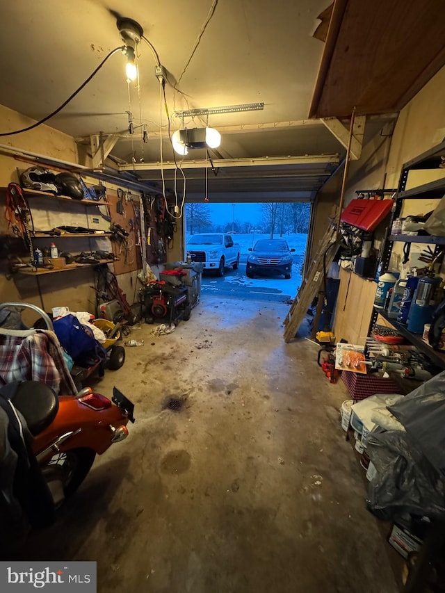 garage featuring a garage door opener