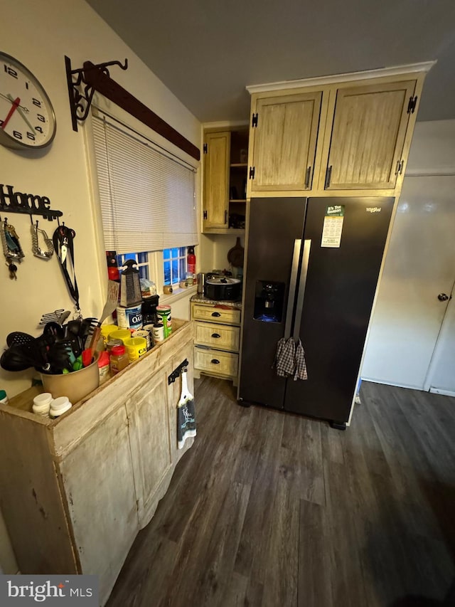 kitchen featuring stainless steel refrigerator with ice dispenser, dark hardwood / wood-style flooring, and light brown cabinetry