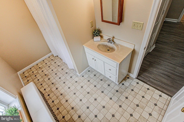 bathroom featuring tile patterned floors and vanity