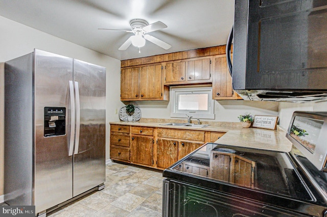 kitchen featuring ceiling fan, sink, range with electric cooktop, and stainless steel fridge with ice dispenser