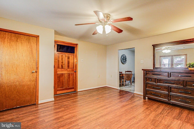 bedroom featuring ceiling fan and hardwood / wood-style floors