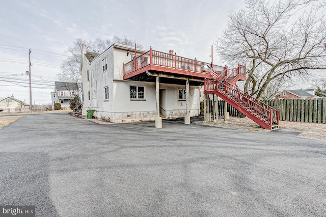 view of front of house with a wooden deck