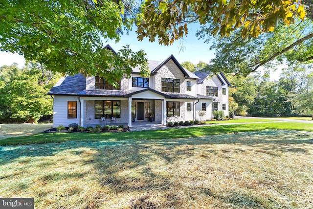 view of front facade with a front lawn