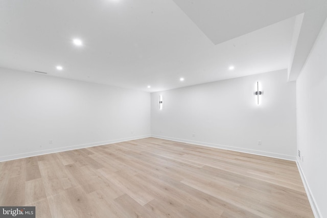 basement featuring light hardwood / wood-style floors