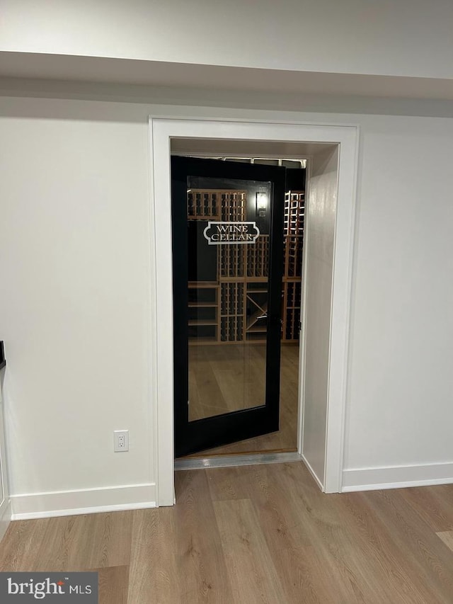 wine area featuring hardwood / wood-style floors