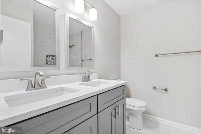 bathroom with toilet and vanity