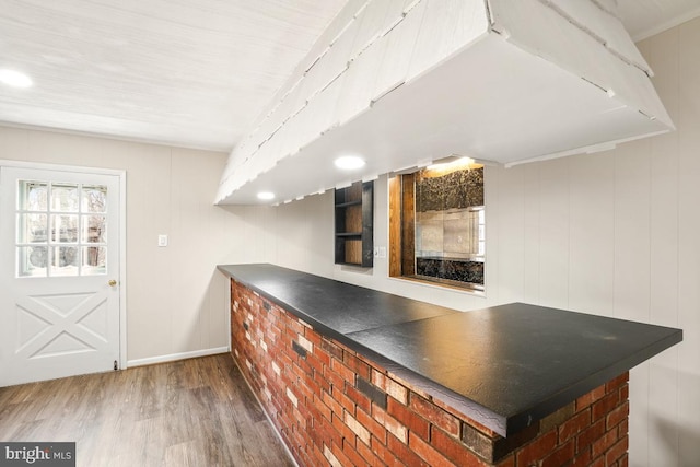 bar with hardwood / wood-style flooring