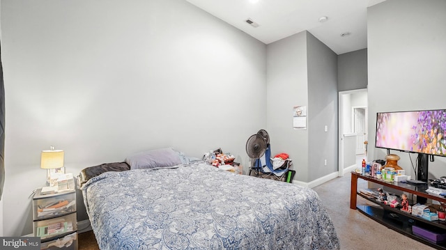 bedroom featuring carpet