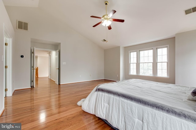 bedroom featuring light wood-style flooring, baseboards, and visible vents