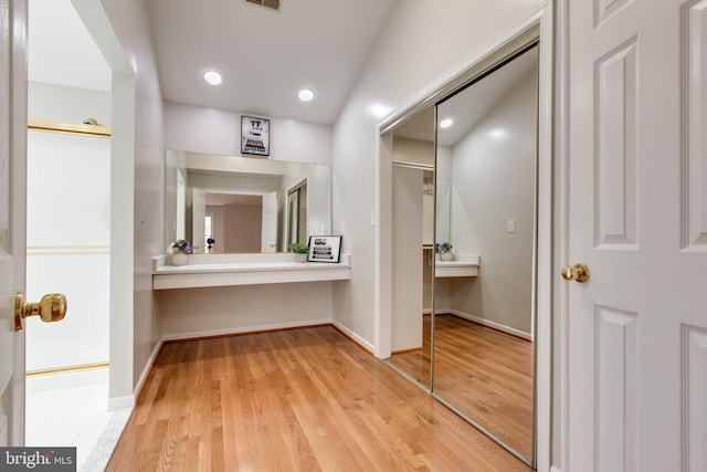 bathroom featuring visible vents, recessed lighting, baseboards, and wood finished floors