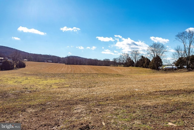 property view of mountains with a rural view