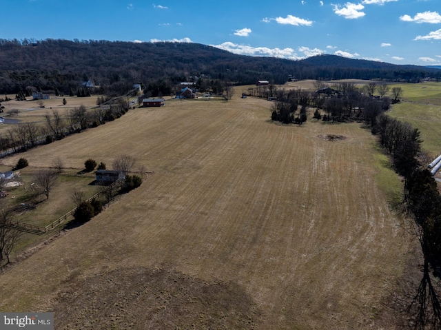 bird's eye view with a mountain view and a rural view