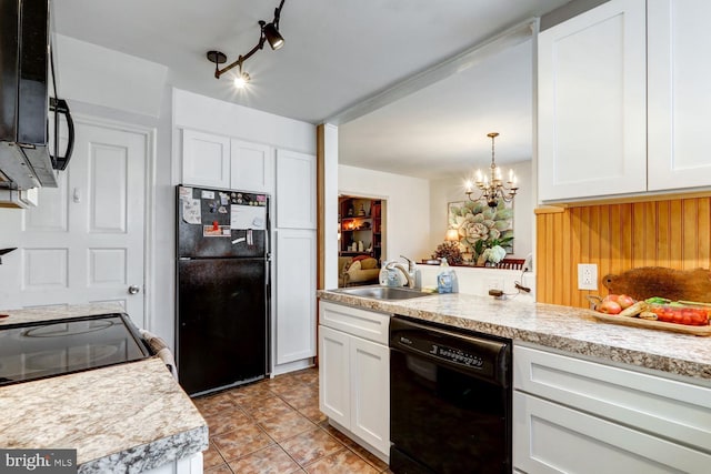 kitchen with sink, decorative light fixtures, black appliances, light tile patterned floors, and white cabinets