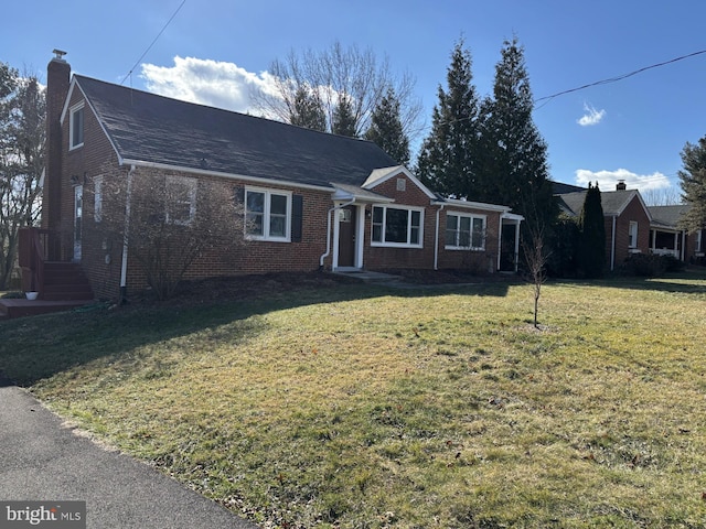 view of front of home with a front yard