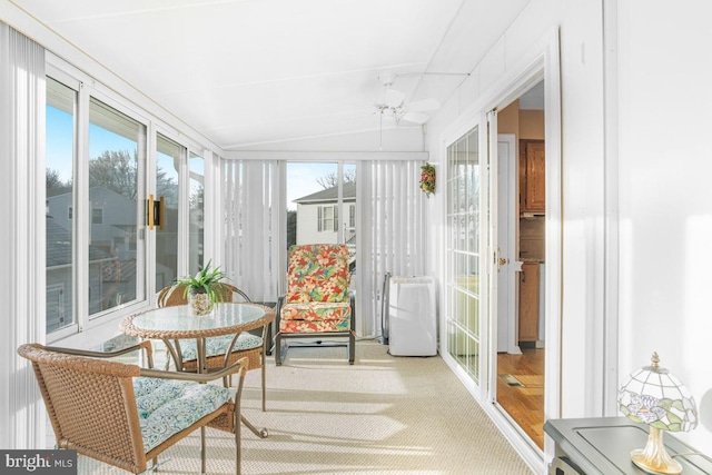 sunroom / solarium with ceiling fan