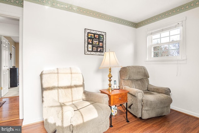 living area featuring hardwood / wood-style floors