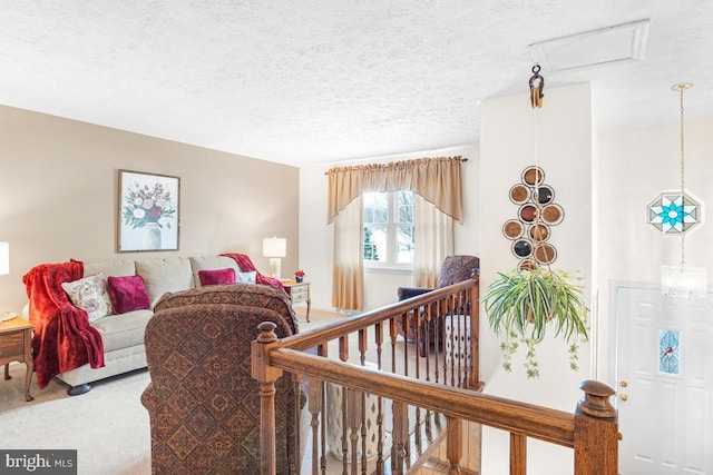 carpeted bedroom with a textured ceiling