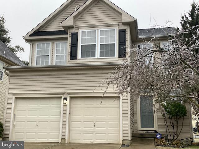 view of property featuring a garage