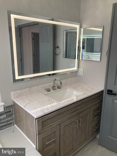 bathroom featuring vanity