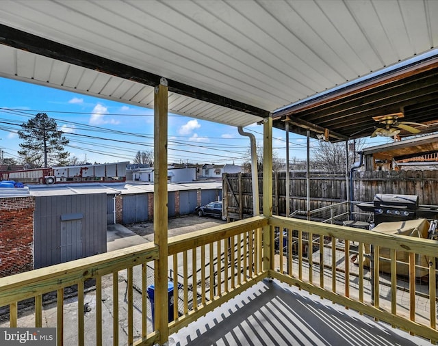 wooden deck featuring grilling area