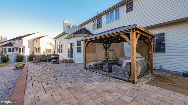 view of patio with a gazebo, grilling area, and an outdoor living space