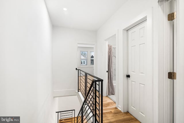 hall with light wood-type flooring