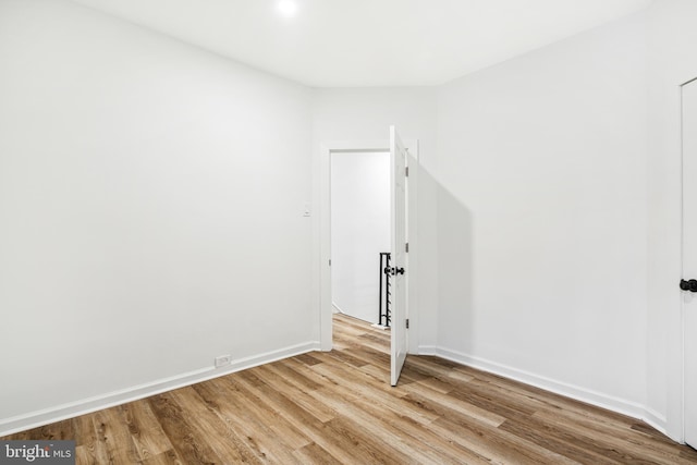 unfurnished room featuring light wood-type flooring