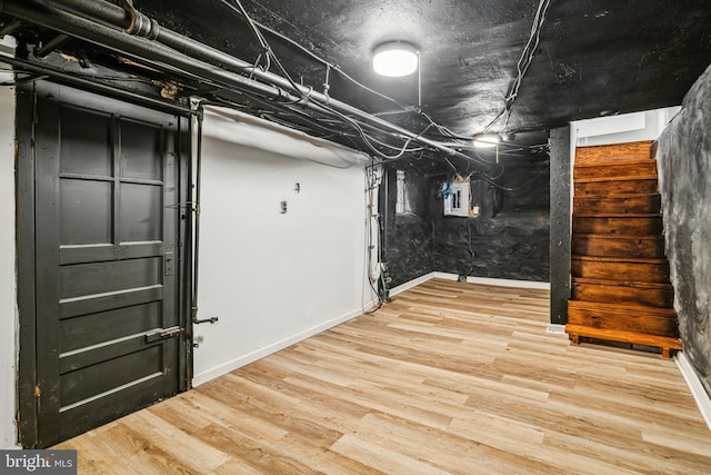 basement featuring light hardwood / wood-style floors