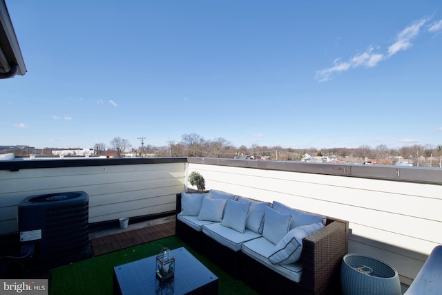 view of patio featuring cooling unit, an outdoor hangout area, and a balcony