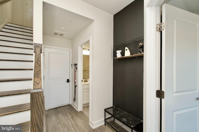 mudroom featuring light hardwood / wood-style flooring