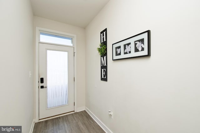 doorway to outside with hardwood / wood-style flooring