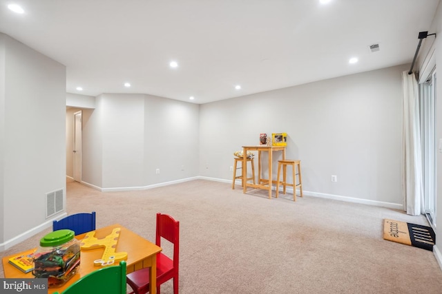 rec room with light carpet, baseboards, visible vents, and recessed lighting