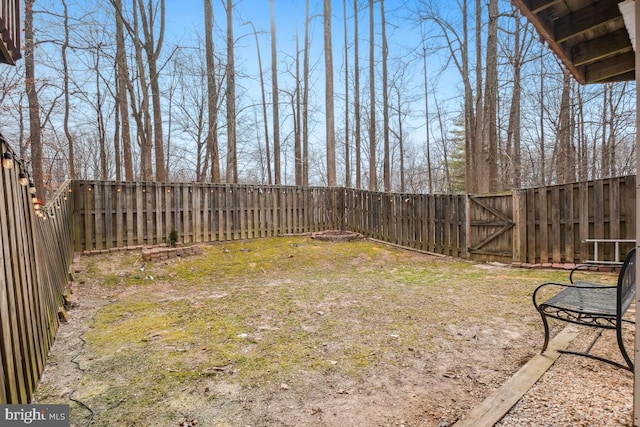 view of yard featuring a fenced backyard