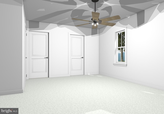 additional living space with light carpet and ceiling fan