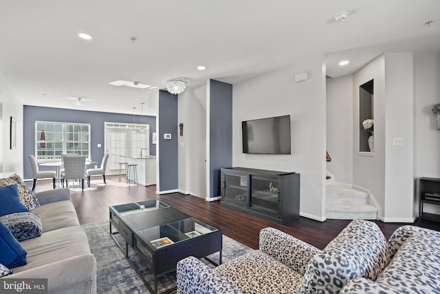 living room featuring dark hardwood / wood-style floors