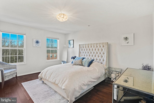 bedroom featuring dark wood-type flooring